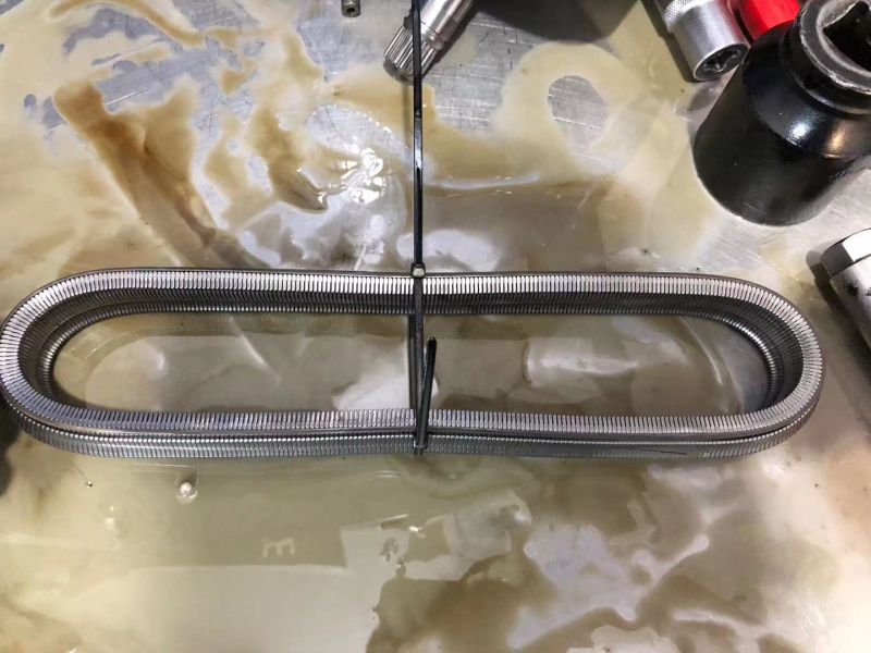 日產(chǎn)系列CVT變速箱進(jìn)水后導(dǎo)致變速箱損壞，變速箱油變質(zhì)發(fā)白，檢修波箱